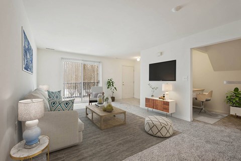 a living room with a couch and a tv